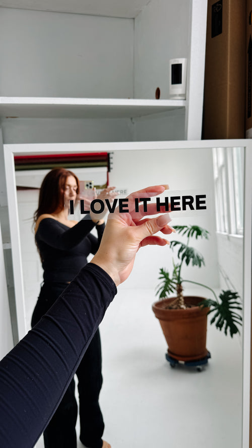 black mirror sticker / I love it here