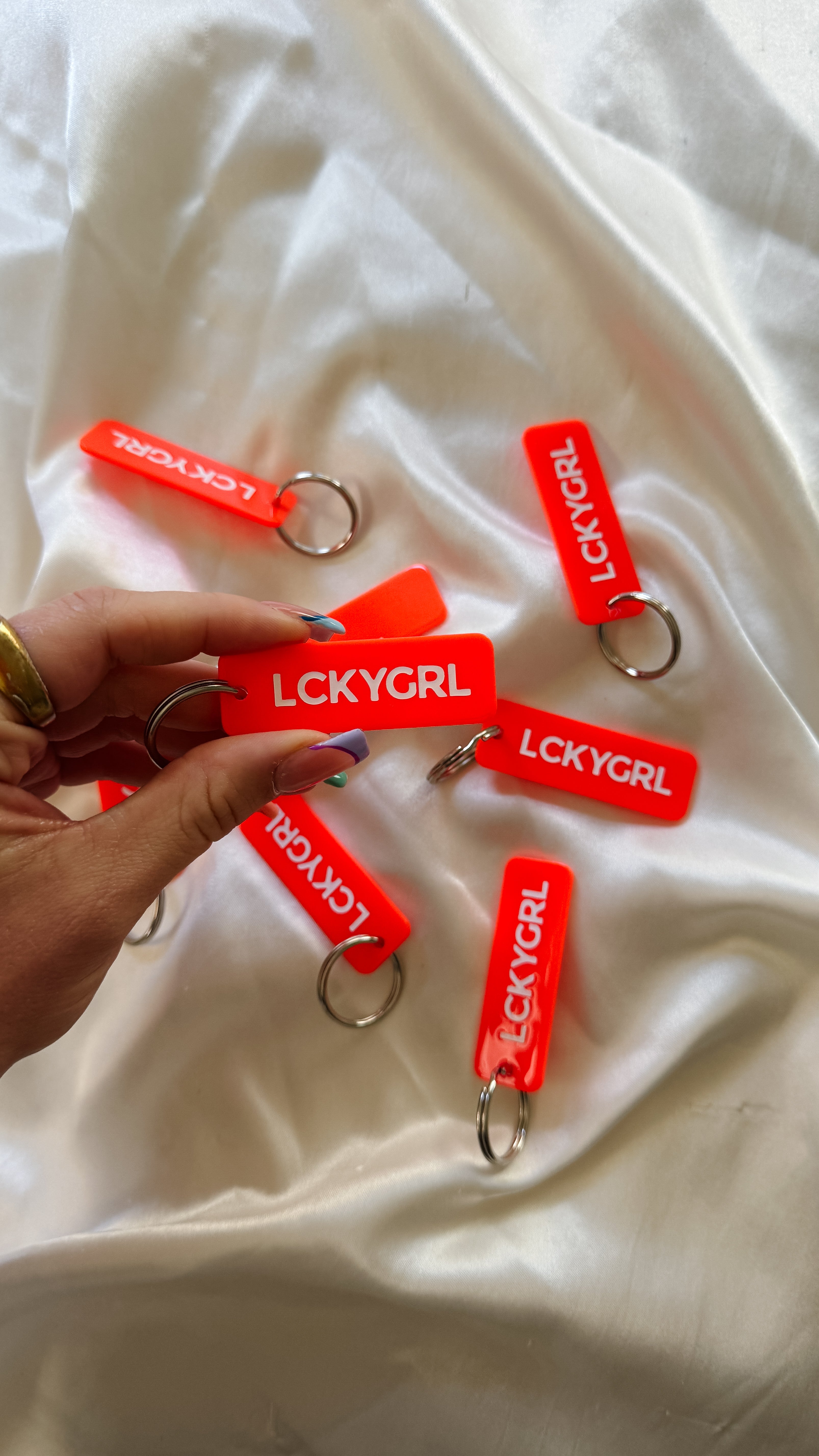 the lucky girl blood orange rectangle keychain