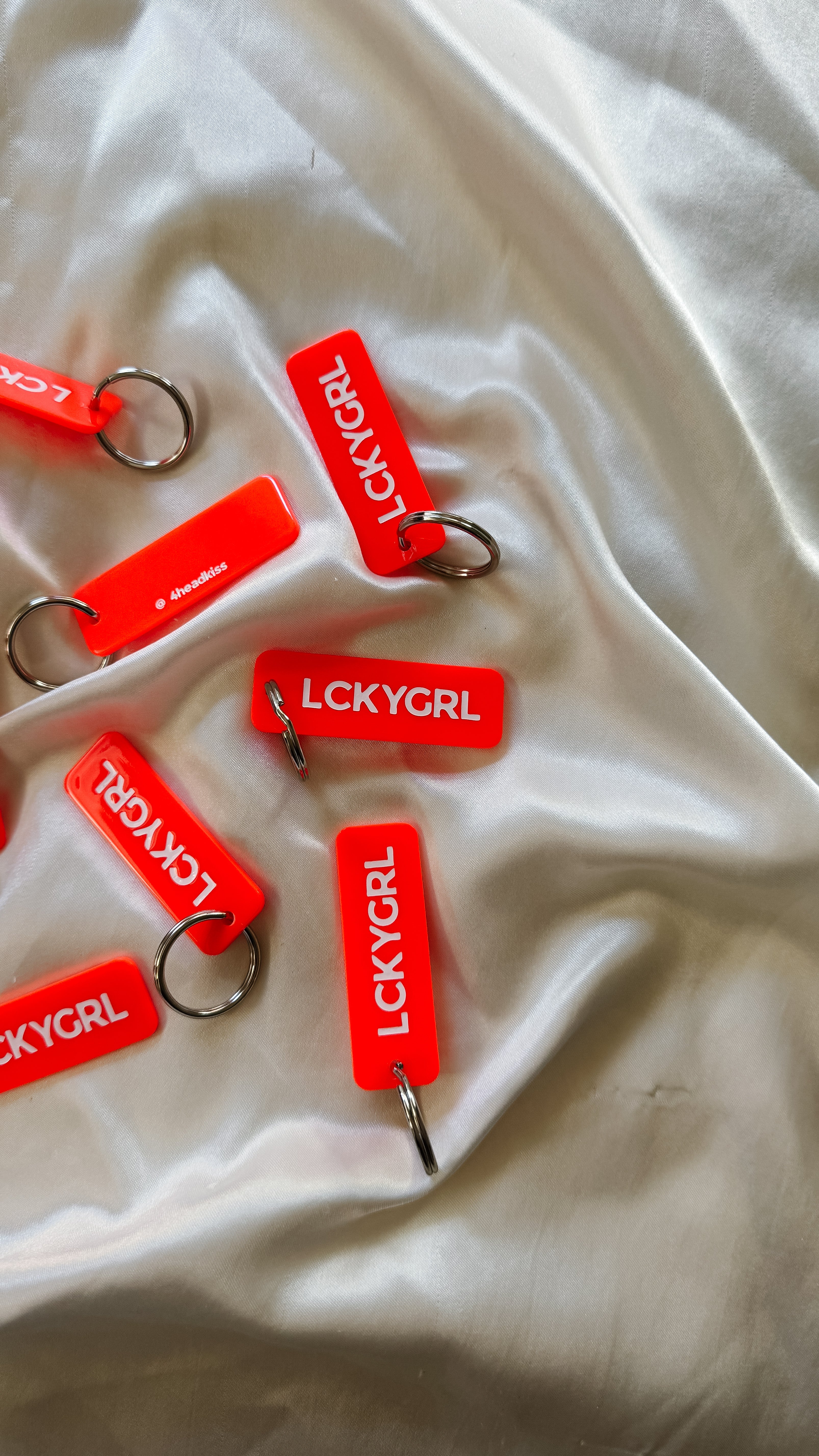 the lucky girl blood orange rectangle keychain