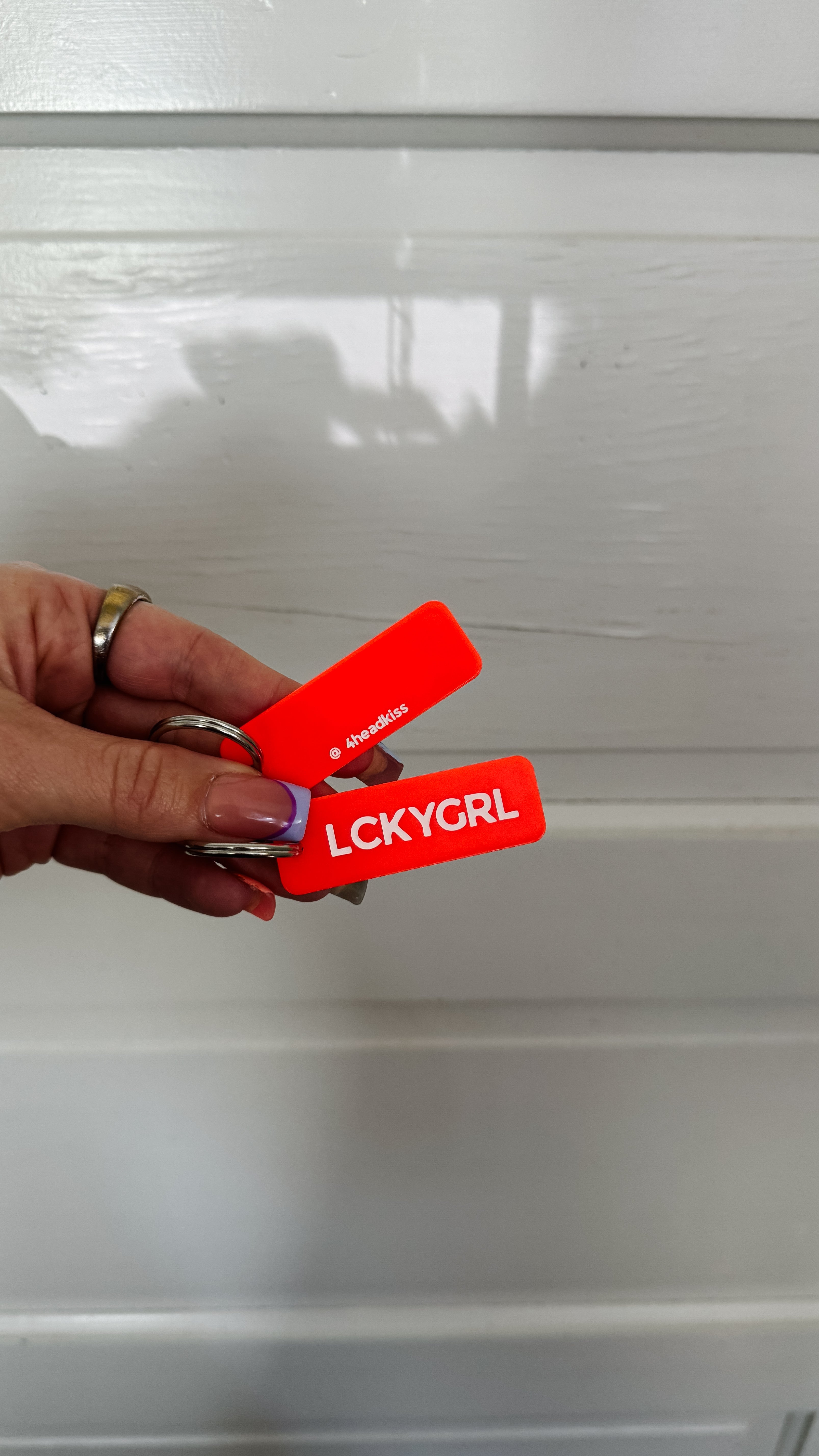 the lucky girl blood orange rectangle keychain