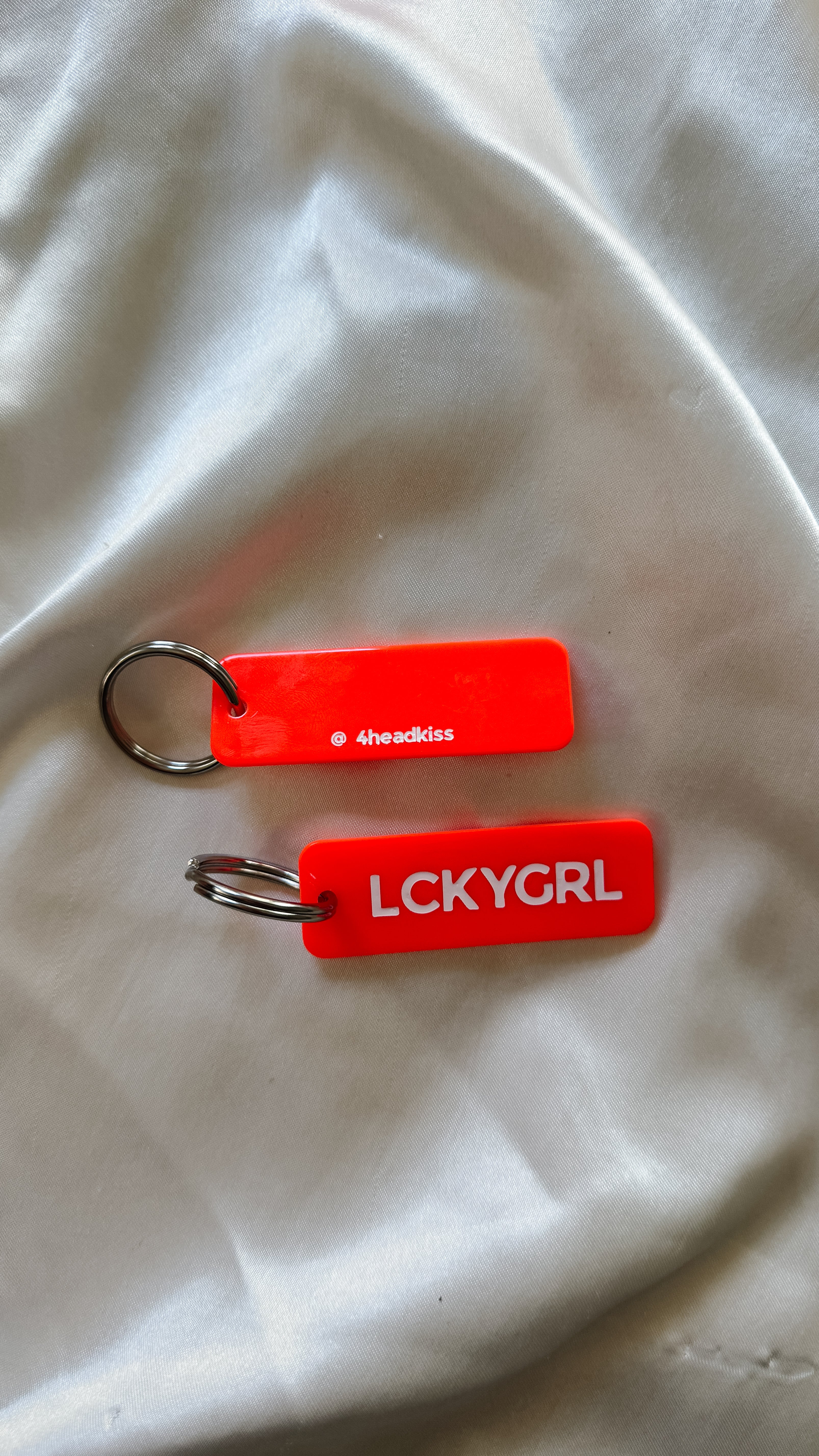 the lucky girl blood orange rectangle keychain