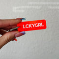 the lucky girl blood orange rectangle keychain