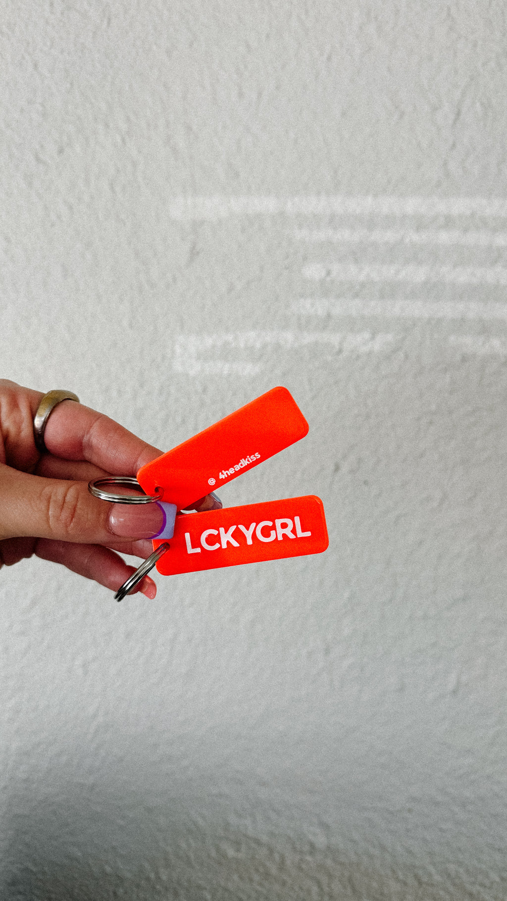 the lucky girl blood orange rectangle keychain