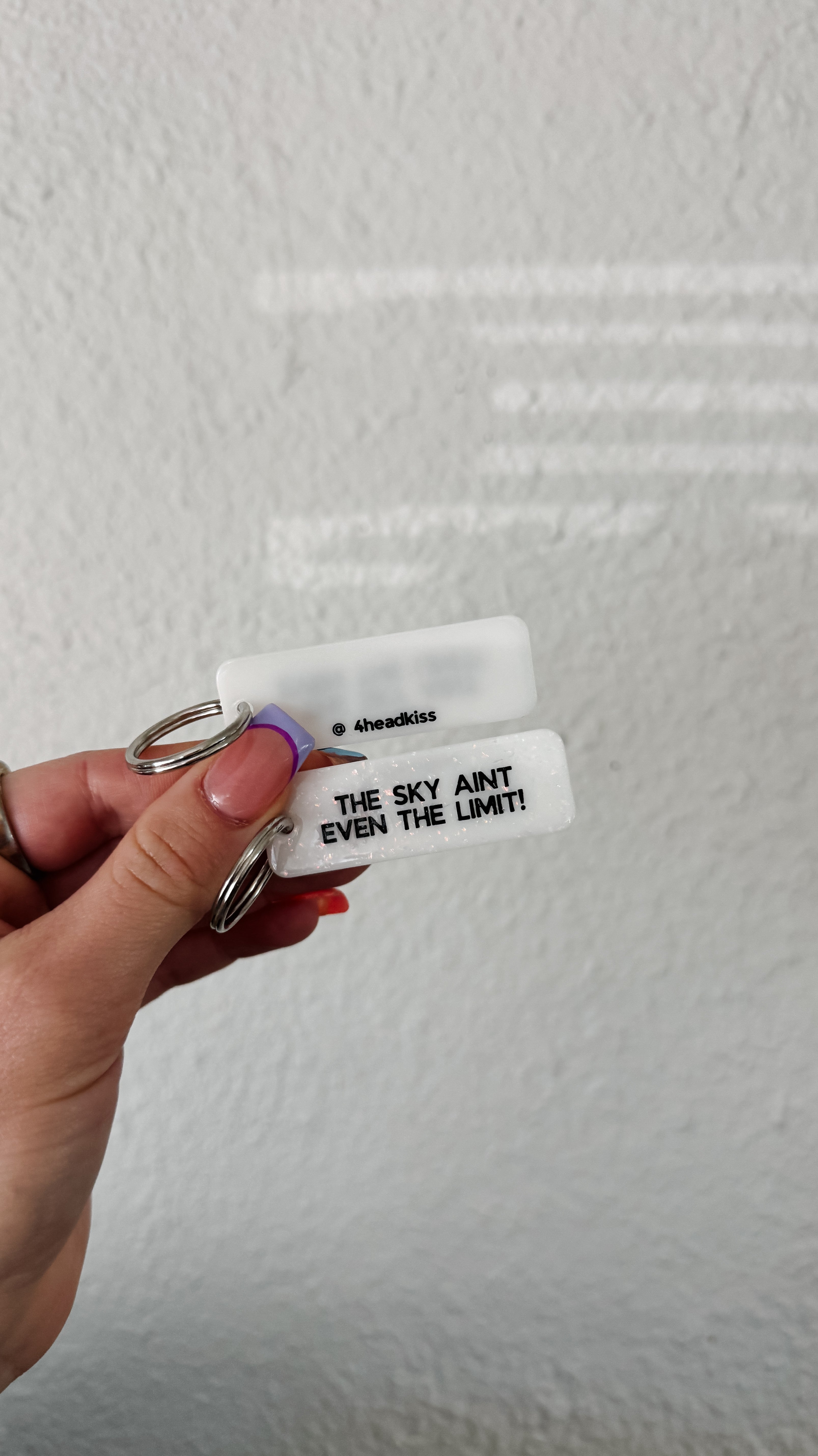 cute white sparkle rectangle keychain / the sky aint even the limit